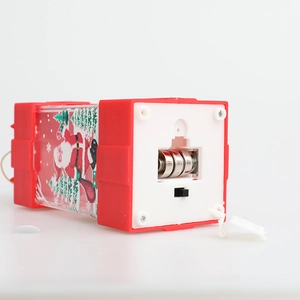 Christmas lantern with Santa Claus prints showing bottom battery case and toggle switch