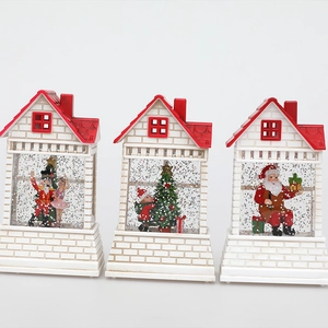 Three-piece Christmas snow globe lanterns with Santa and nutcracker in white house design