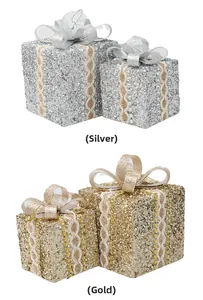 Glittery gold and silver Christmas gift box ornaments with lace ribbons for tree decor
