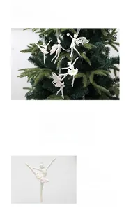 Detail of white ballet girl Christmas tree ornaments with pearlescent finish and ribbon