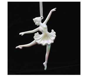 Detailed close-up of a white ballet girl ornament with iridescent finish for Christmas