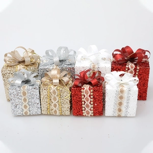 Set of 8 glittery Christmas gift box ornaments in red, white, gold and silver colors
