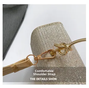 Detail of glitter evening bag with gold lobster clasp and comfortable shoulder strap