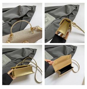 Detail view of champagne gold evening bag with glitter texture and metal ring handle