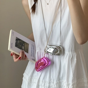Metallic oval clutch bag with silver and pink mirror finish and delicate chain strap