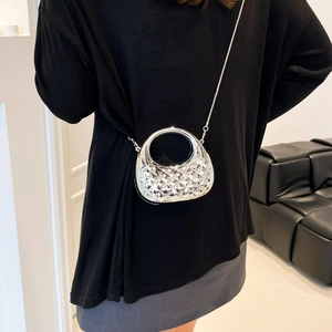 Silver mini acrylic crossbody bag with diamond quilted texture and sleek metal chain