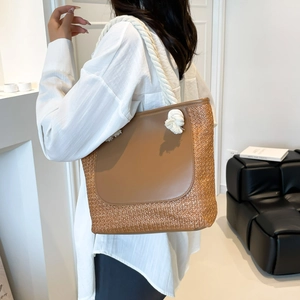 Fashionable large capacity woven straw tote bag with brown leather and cotton rope strap