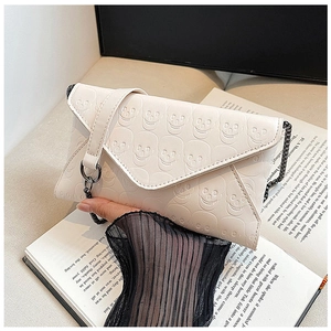 Chic beige envelope clutch with skull embossing and dark metal chain strap for women