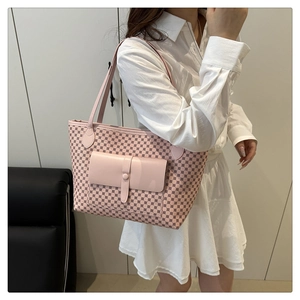Pink tote bag side view on model showing daily commuting style and real size