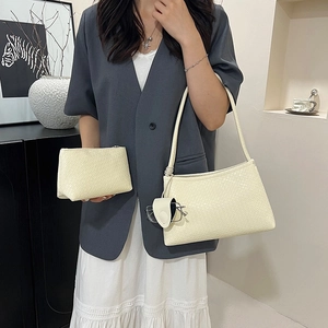 Cream white woven texture hobo bag set featuring shoulder bag and small zipper pouch