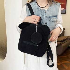 Schwarze Cord-Eimertasche mit niedlichen Tierohren und passender runder Münzbörse