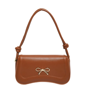 Brown faux leather shoulder bag with gold bow ornament and knotted strap detail