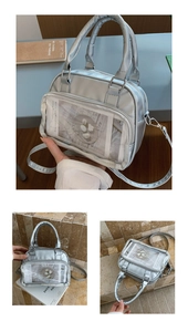 Detail of silver metallic PU tote bag featuring a transparent PVC display window pocket