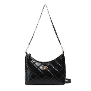 Elegant black quilted dumpling bag with gold chain strap and metallic hardware buckle
