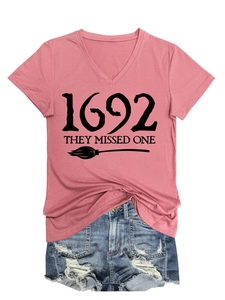 Detail of V-neck T-shirt with 1692 text print and distressed denim shorts set