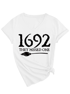 Detail of white V-neck T-shirt with 1692 text, broom graphic and side knot design