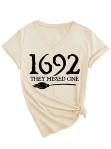 Detail of V-neck T-shirt showing 1692 they missed one text with broom graphic