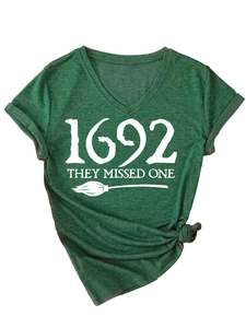 Detail of V-neck dark green T-shirt with 1692 they missed one print and knotted hem