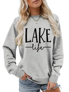 Detailed close-up of grey LAKE life sweatshirt fabric texture and ribbed cuff finish