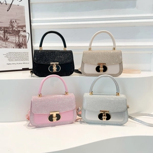 Minimalist square handbags with sequin lids and gold T-locks in four elegant colors