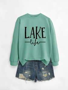 Detail of ribbed crew neck and LAKE life print on mint green casual long sleeve sweatshirt