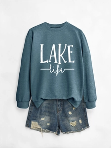Close-up of Lake Life printed sweatshirt with crew neck and ribbed cuffs detail