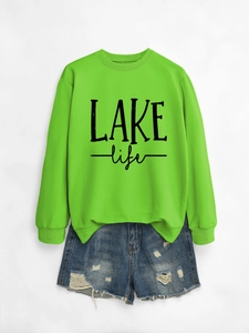 Detail of ribbed collar and LAKE life print on neon green loose crewneck sweatshirt