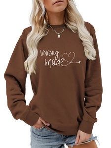 Detail of Vacay Mode heart graphic and ribbed cuffs on brown long sleeve sweatshirt