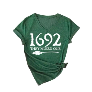 Women's V-neck heather green T-shirt featuring 1692 They Missed One print and broom