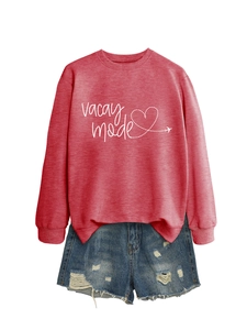 Flat lay of red vacay mode sweatshirt paired with distressed blue denim shorts