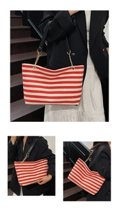 Three-way view of red and white striped tote bag with black leather and chain strap