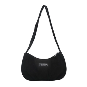 Minimalist black corduroy crescent underarm bag with pleated design and brand label