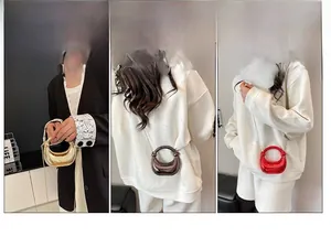 Elegante bolso de mano creciente metálico con detalles de cuentas en oro, gris y rojo