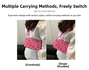 Pink cherry print crossbody bag showing adjustable wide shoulder strap for two-way styling