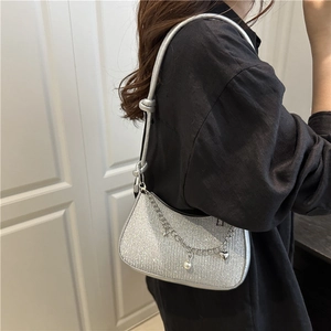 Sparkly silver sequin underarm bag with knot strap and decorative heart pearl charms