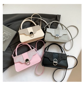 Detailed view of four elegant crossbody bags in white, grey, pink, and black colors