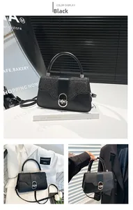 Detail of black crossbody bag featuring sparkling glitter flap and silver turn-lock closure