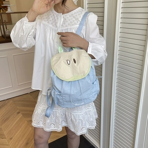 Japanese style light blue crinkled nylon backpack with beige flap and bear print