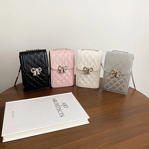 Chic quilted mini crossbody phone bags with metallic bow clasps in four trendy colors