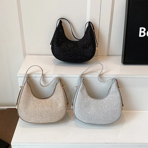 Minimalist hobo shoulder bags in black, gold and silver sequins with metallic buckle