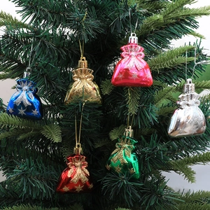 Set of six colorful metallic Christmas tree drawstring bag ornaments with glitter stars