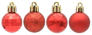 Detailed view of red Christmas ornaments with glitter, matte, glossy, and faceted textures