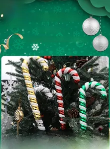Detail of Christmas candy cane ornaments with glitter spiral stripes for tree decoration
