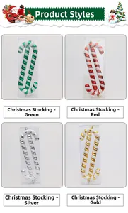 Detail of glittery Christmas candy cane decorations in four festive colors with gift boxes