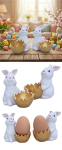 Close-up of Easter bunny figurines with gold egg shell holders for festive decor