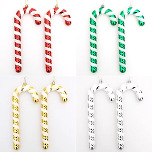 Set of four colorful Christmas candy cane ornaments with spiral glitter stripes and hanging cords