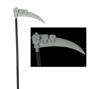 Detail showing the gray plastic blade with three skull reliefs on a grim reaper scythe