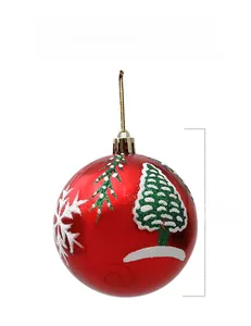 Detail view of an 8cm red Christmas ball featuring white snowflakes and tree patterns