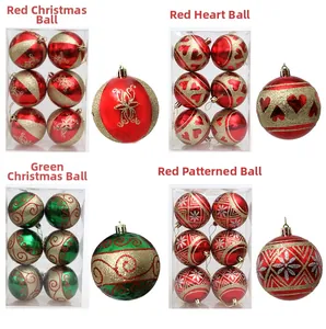 Close-up of 8cm painted Christmas balls with red glitter stripes and festive patterns