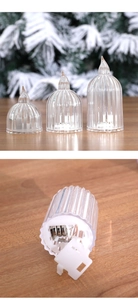 Detail view of acrylic flickering LED candles with battery compartment on bottom
